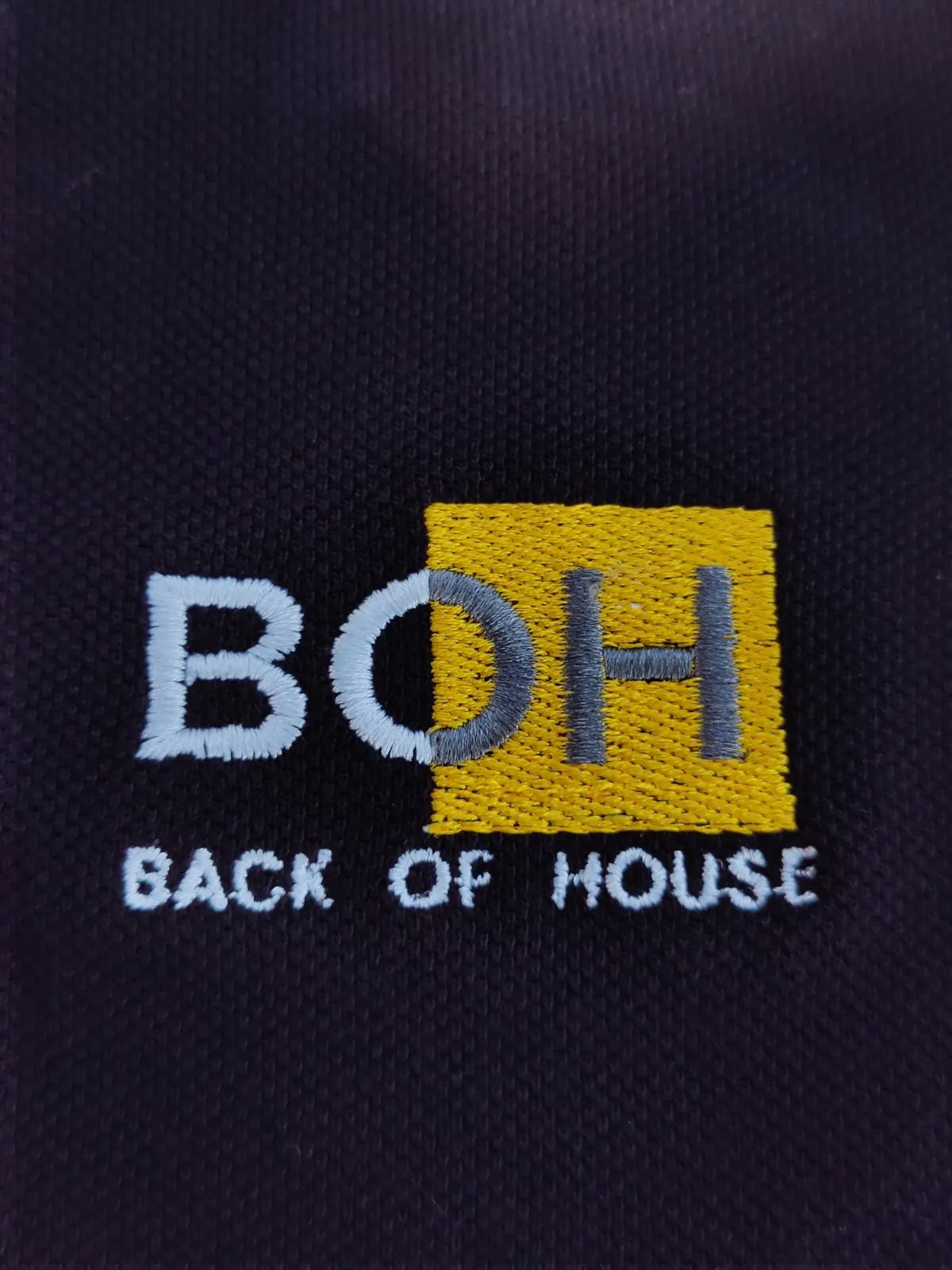 Embroidered logo polos, Back of House