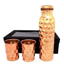 Hammered copper bottle and glasses