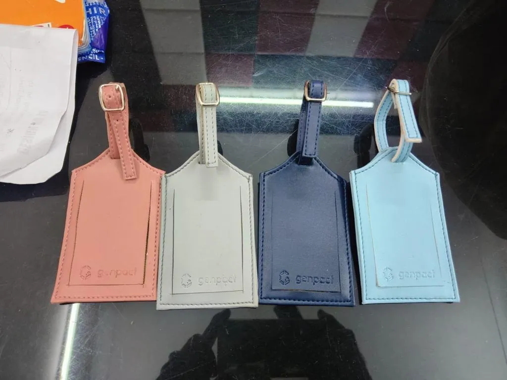 Leather luggage tags in pastel shades
