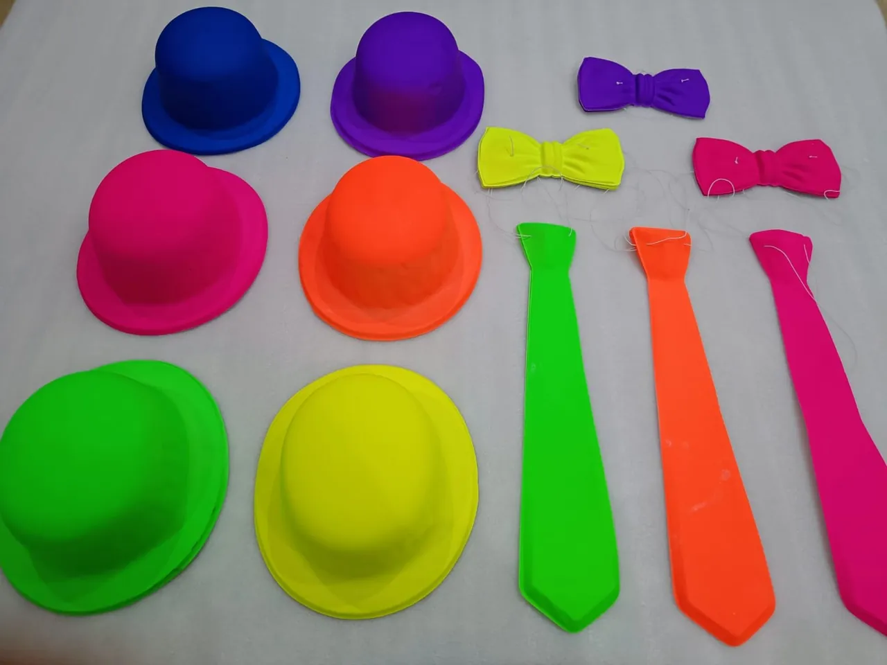 Neon hats, bow ties and ties